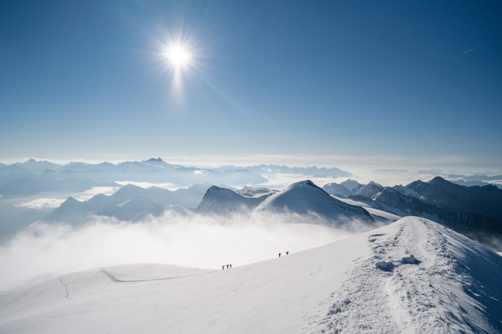group,alpinists,on,an,adventure,ascent,on,high,alpine,peak